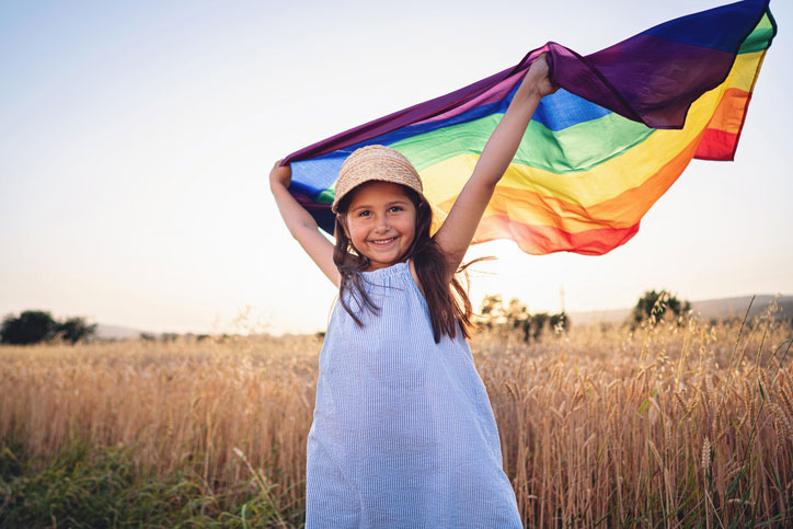 kid dancing in field