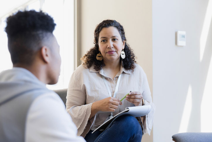 professor listening to student