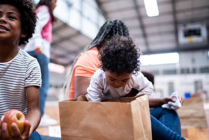 mom and baby boy at food bank