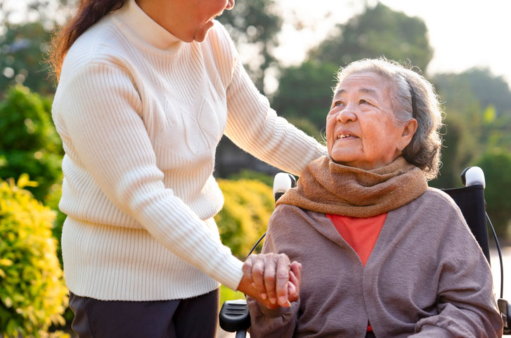 happy grandma in wheelchair