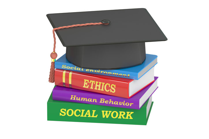 grad cap and social work books